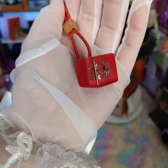 Pink Louis Vuitton Red hair Tie cubes with monogram Gold crystal accents
